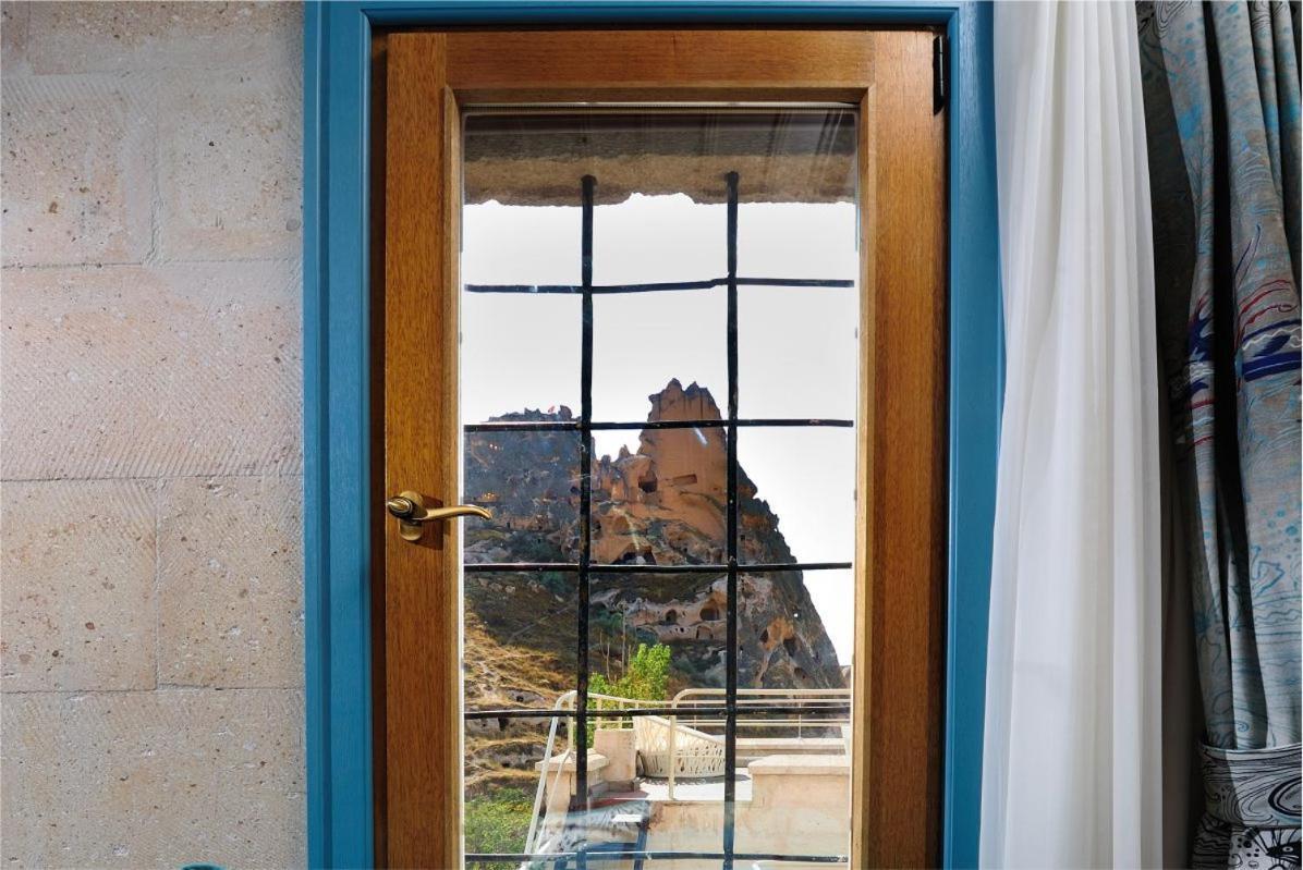 Anatelein Cave Hotel Üchisar Bagian luar foto